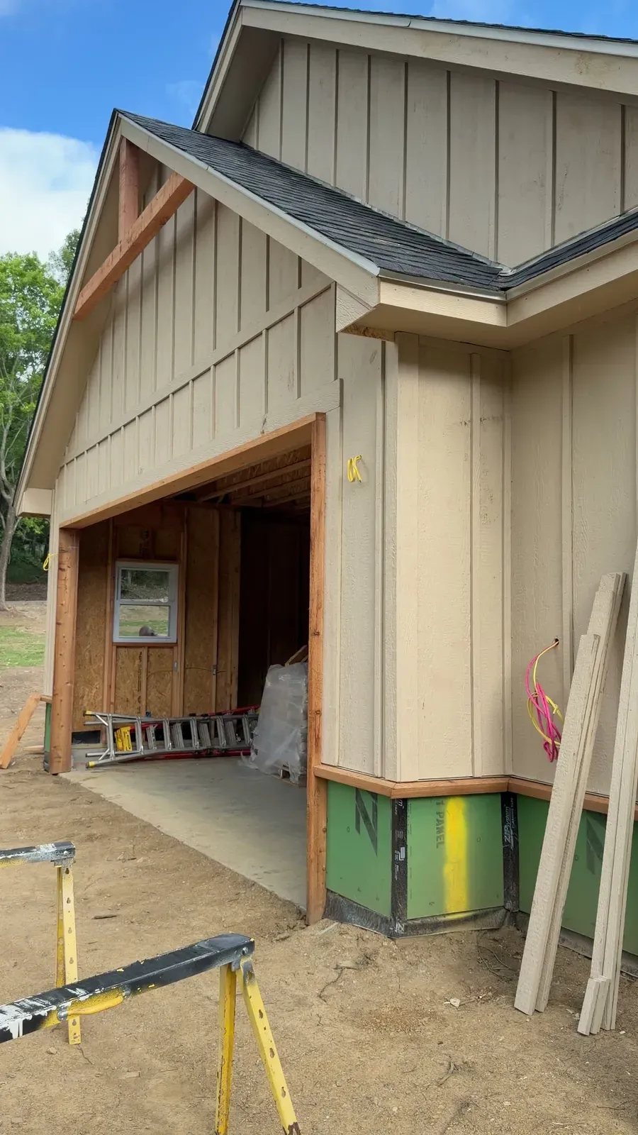 Board and batten siding being installed on a new build in Oklahoma