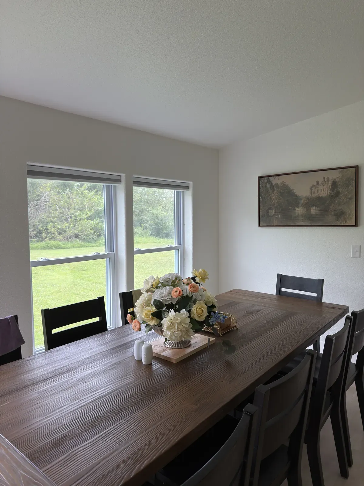 Pair of new double-hung windows in a dining room
