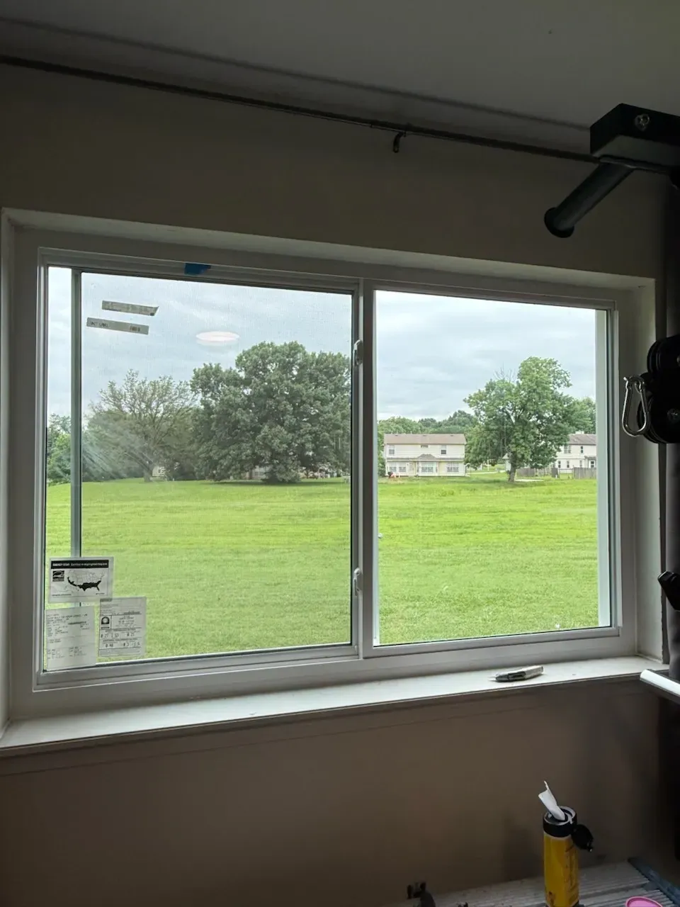 After: a new white vinyl sliding window installed by Morgan Windows in the same opening